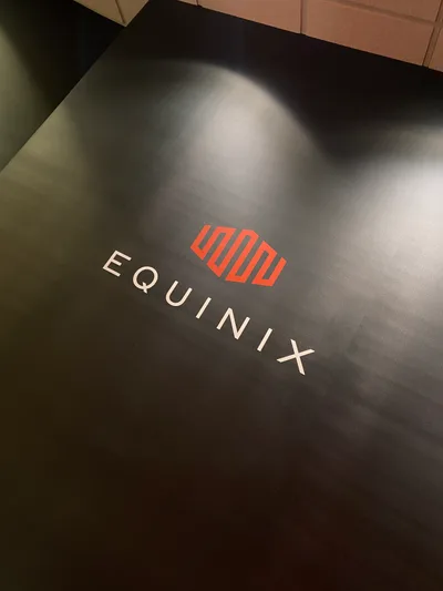 Blue-lit server corridor at Equinix SV2, Santa Clara, California